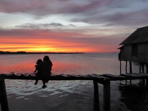 Lydia and her host sister Karmen enjoy the sunset in the Bajo village of Sampela.