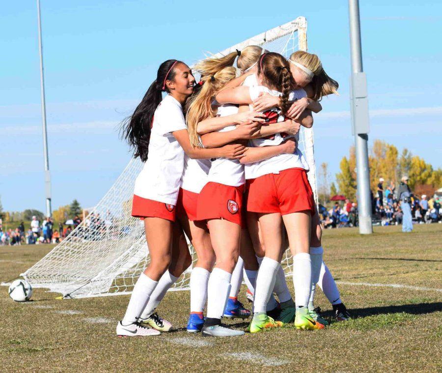 Girls Varsity celebrates after a scored goal. The team placed second overall.
