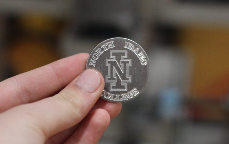 Students were provided with the opportunity to observe the finished product of the CNC machine. The coins were double sided and included NIC’s logos.
