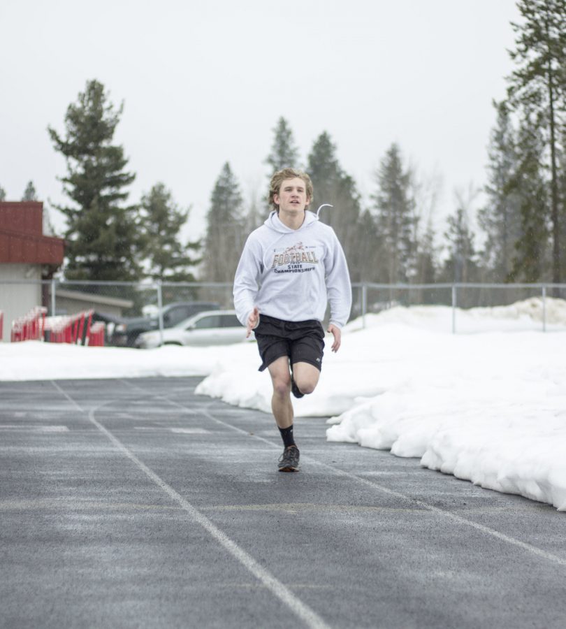 The snow affects the performance of the track and field member causing them to practice indoors to work on form and and running.