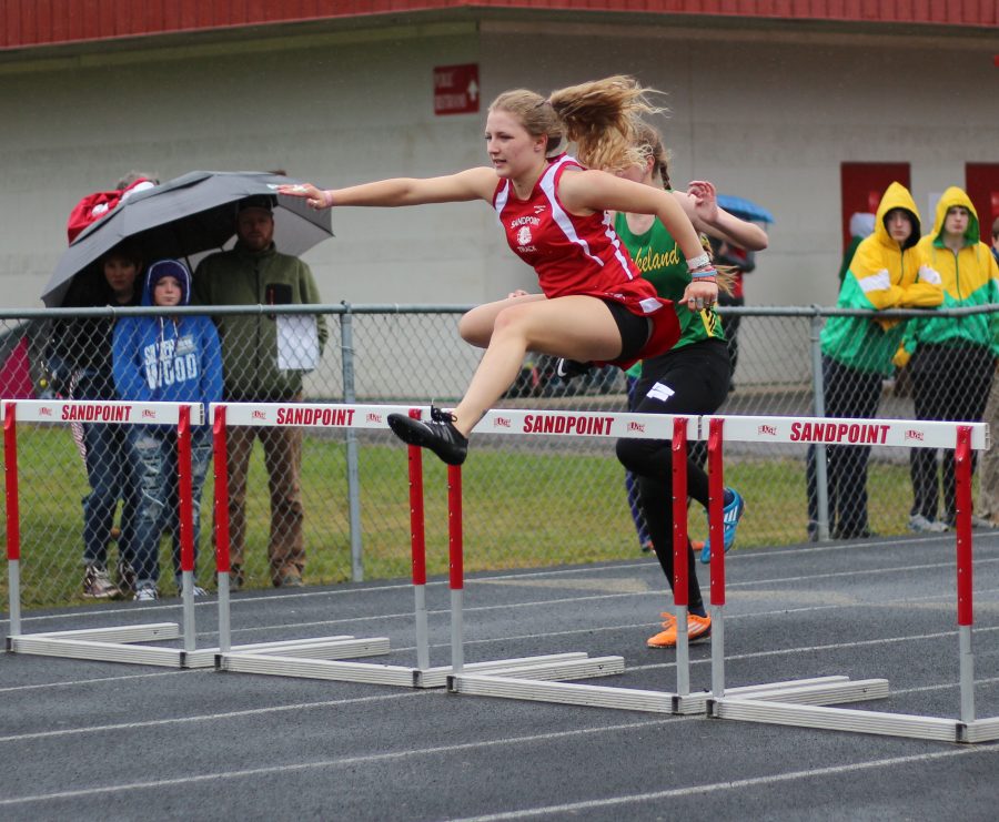 Sophomore Brooke Davis leaps over the hurdle in the Women’s 100m hurdles- 33”. She placed fifth in her event.  