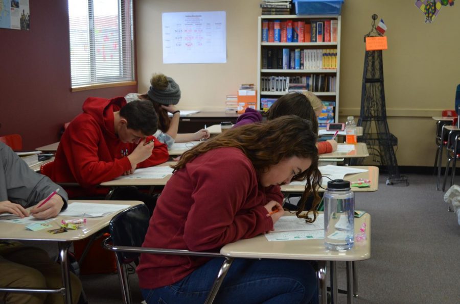 Academic Decathlon team members takes a practice test in preparation for state competition.