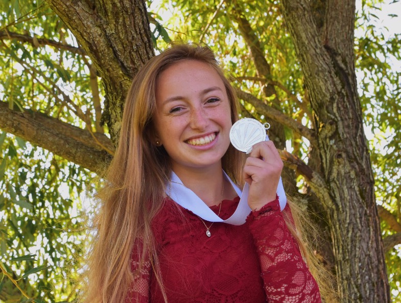 Camille Neuder poses with the medal she recieved from winning Sandpoints local Distinguished Young Woman program.